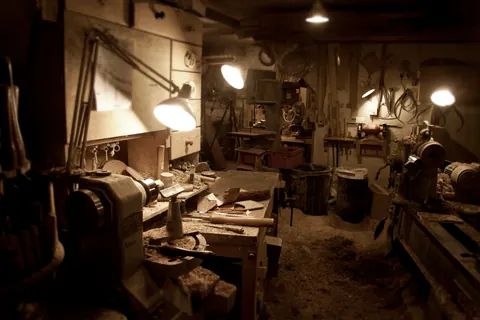 Carpenter crafting a piece of furniture
